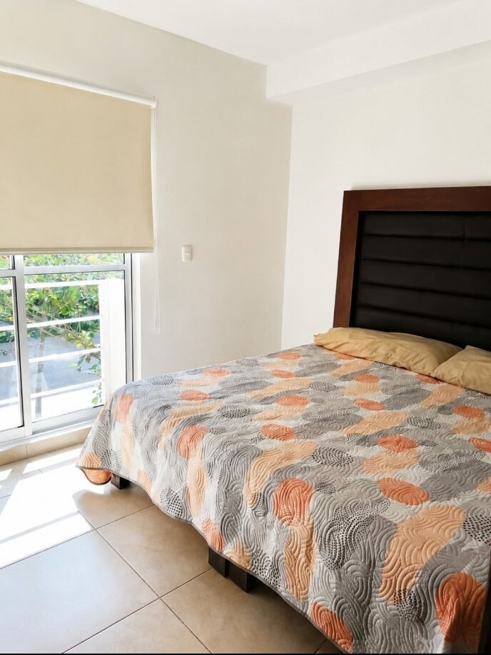 Recámara principal con cama king size